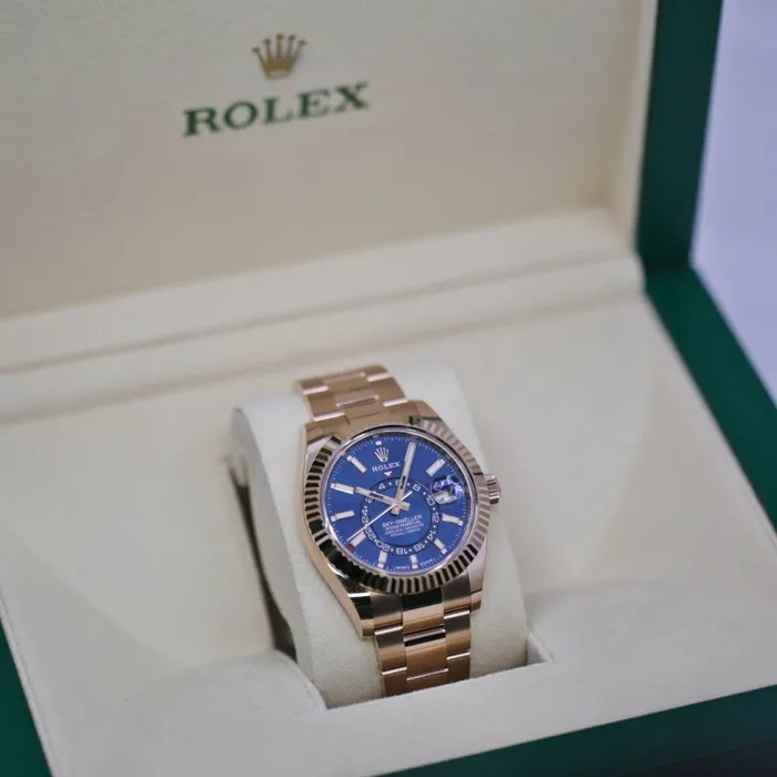 Rolex Rolex SkyDweller 42mm Ref 336935 BlueGreen Stick Dial 18K Rose Gold Oyster Bracelet Watch Bracelets
