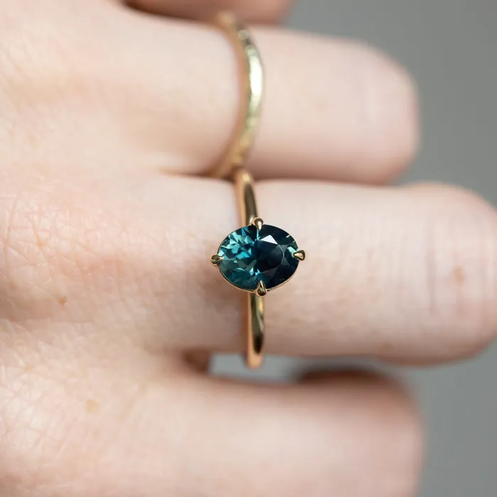 165ct Untreated Deep Teal Nigerian Oval Sapphire Four Prong Compass Set Solitaire in 18k Yellow Gold Brume PreStyled Sets