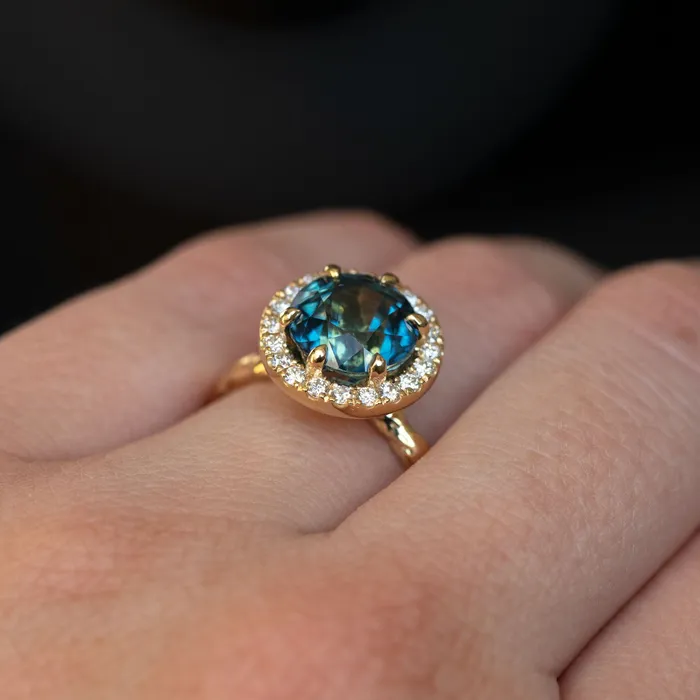 427ct Blue Madagascar Sapphire Six Prong Halo Evergreen Ring in 18k yellow gold Anueva Jewelry Rings
