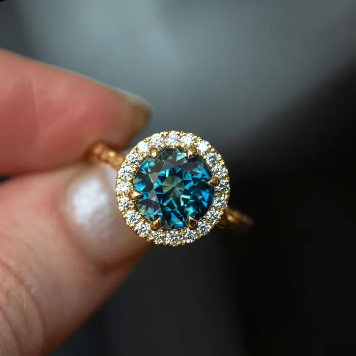427ct Blue Madagascar Sapphire Six Prong Halo Evergreen Ring in 18k yellow gold Anueva Jewelry Rings