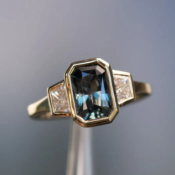 Rings 202ct Untreated Radiant Cut Color Shifting Sapphire and White Diamond Three Stone Bezel Set Ring in 14k Yellow Gold NASHAN
