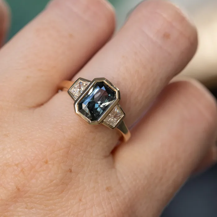 Rings 202ct Untreated Radiant Cut Color Shifting Sapphire and White Diamond Three Stone Bezel Set Ring in 14k Yellow Gold NASHAN