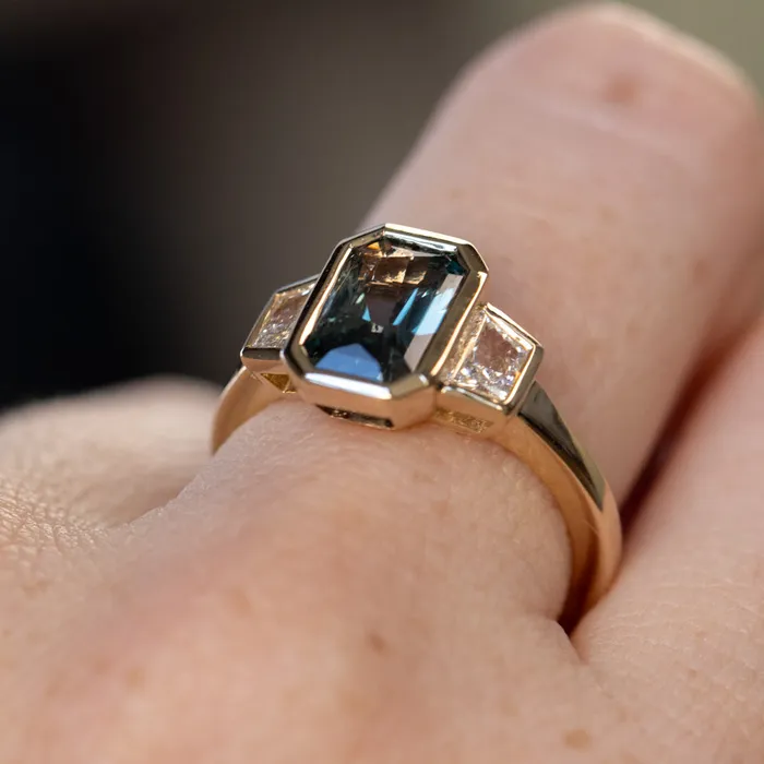 Rings 202ct Untreated Radiant Cut Color Shifting Sapphire and White Diamond Three Stone Bezel Set Ring in 14k Yellow Gold NASHAN